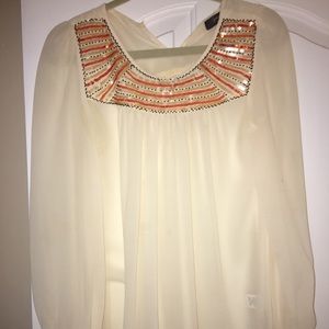 Sheer blouse with bead detail